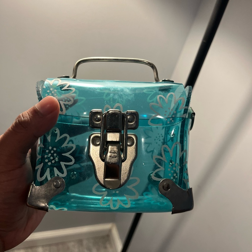 beautiful 90s/y2k pvc clutch bag. Made in the USA super unique. Teal see thru